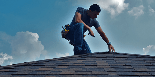 Happy homeowners with new roof